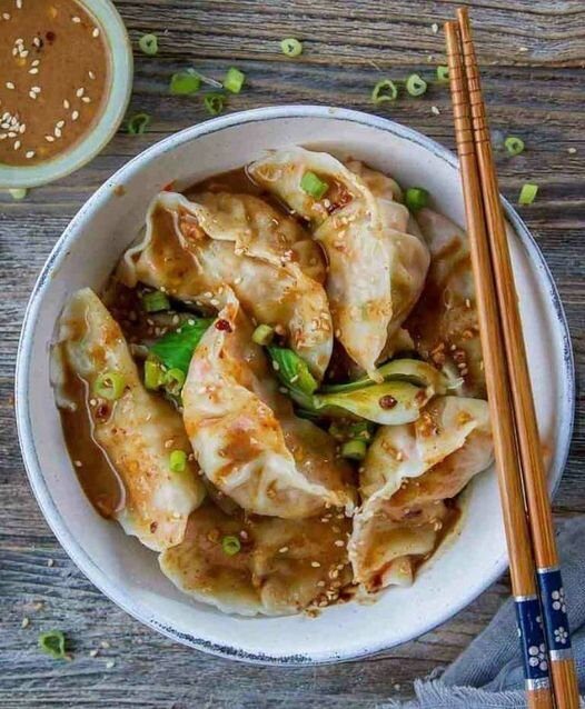 Dumplings in spicy nut sauce