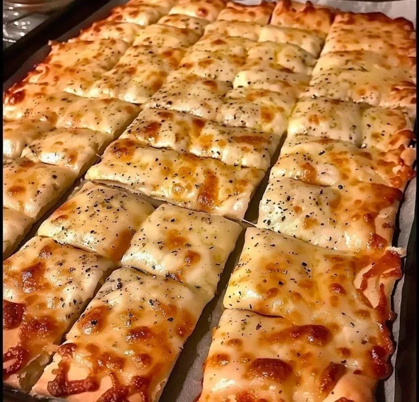 HOMEMADE CHEESY GARLIC BREADSTICKS