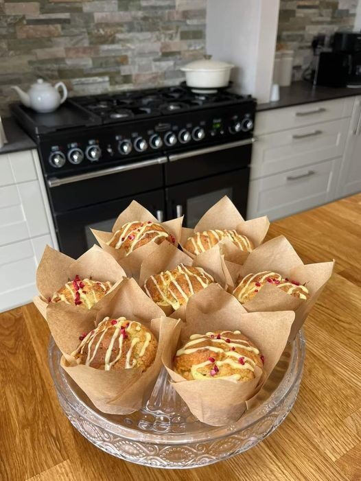 Bakery-Style Vanilla Muffins with Glaze & Raspberry Sprinkle